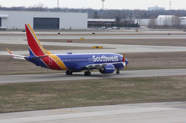 Boeing 737 MAX 8 (N8713M) - Southwest Airlines Boeing 737-8 Max sitting on taxiway "Delta", waiting for another 737-800 to push from gate 5 in Columbus, Ohio. Level 5 in the garage. 