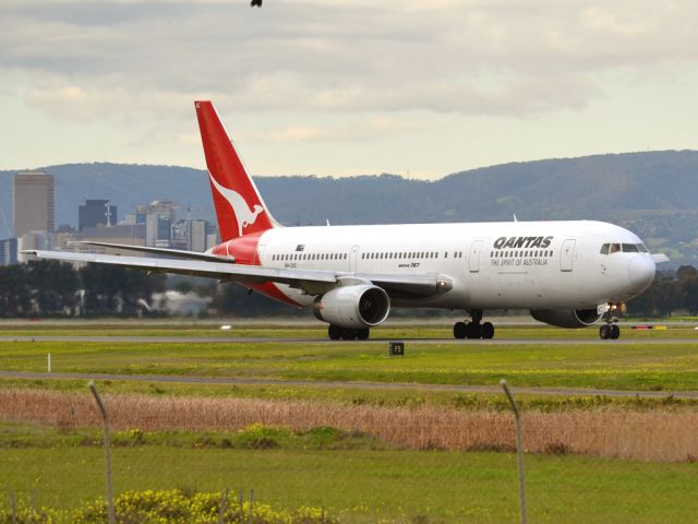 BOEING 767-300 (VH-ZXC) - On taxi-way heading for take off on runway 05, for flight to Sydney. Thursday 12th July 2012.