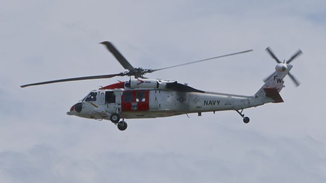 Sikorsky S-70 (16-5758) - A USN Sikorsky MH-60S Knight Hawk makes a low pass over Rwy 34L on 4/21/16. The aircraft is based at NAS Whidbey Island, WA.