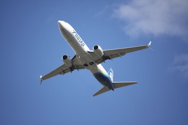 Boeing 737-700 (N409AS) - I was at the South end of the runway getting the best I could of this Boeing.