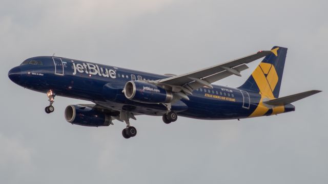 Airbus A320 (N775JB) - JetBlue Airbus 320-232, named "Vets in Blue" arriving on runway 29 at Newark from Montego Bay, Jamaica.