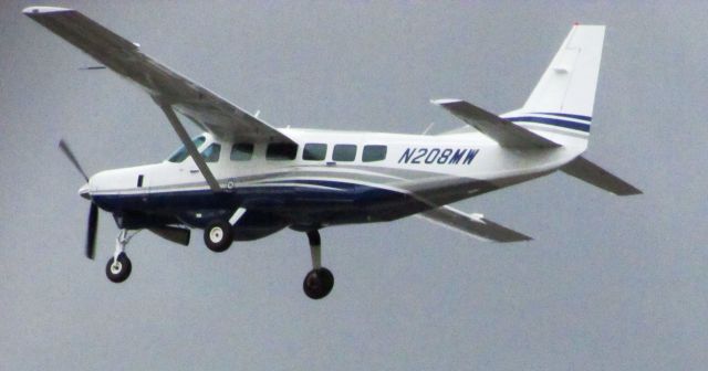 Cessna Caravan (N208MW) - Taking off RWY 26R