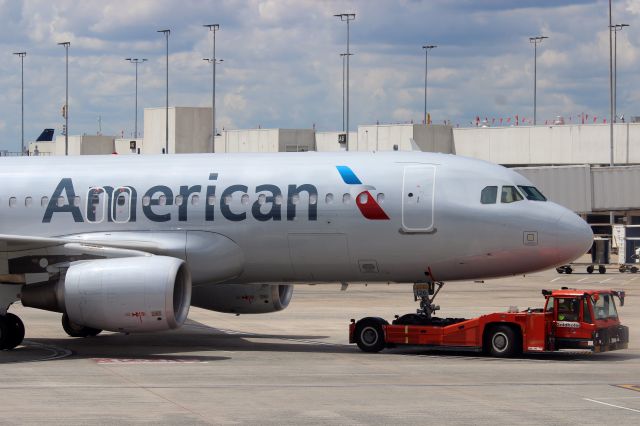 Airbus A320 (N126UW) - Empty A320 being towed to the gate for her next flight at CLT airport in summer 2016