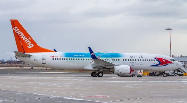 Boeing 737-800 (C-GTVF) - This Travel Service 738 waits for her next mission to the Carribean operated by Sunwing for the season