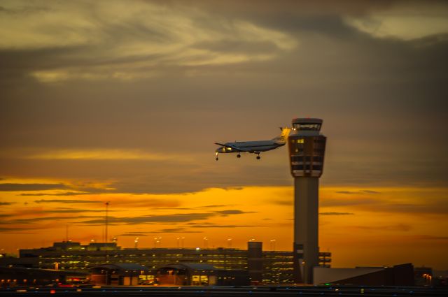 Beechcraft 1900 (N112YV) - Beech 1900 lands at Phoenixs Sky Harbor Airport at the tail end of an incredibly beautiful sunset. ©Bo Ryan Photography | a rel=nofollow href=http://www.facebook.com/BoRyanPhotowww.facebook.com/BoRyanPhoto/a Please vote if you like the image!