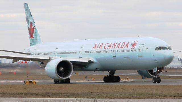 BOEING 777-300ER (C-FRAM) - April 7 2018