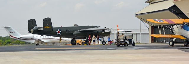 North American TB-25 Mitchell — - Only at a small airport, a bommer, a jet, a bi-plane and a dog on a golf cart.  Aint it great!!