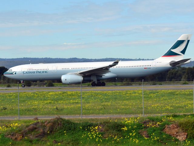 Airbus A330-300 (B-LAJ) - Rolling for take off on runway 05, for flight home to Hong Kong via Melbourne. Thursday 12th July 2012.