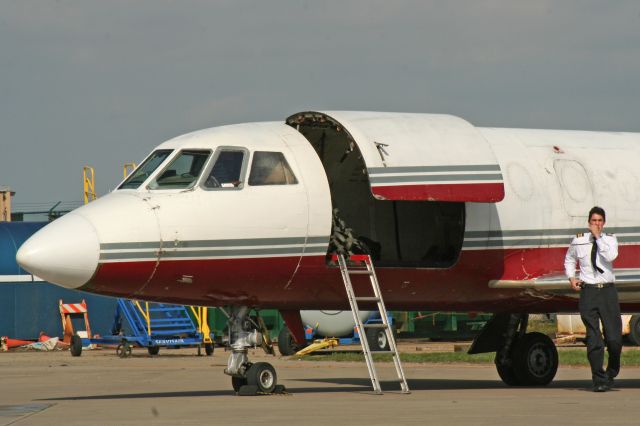 Dassault Falcon 20 (N764LA) - Found this Dassault Falcon 20EW in my archives. I caught it on the cargo ramp on 3 Apr 2006. This aircraft has changed owners and registrations several times since first delivered in 1970. It is still operating today (8 Jan 2022) as N120RA.