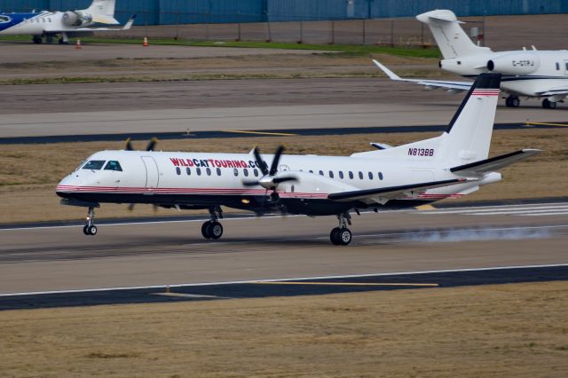 Saab 2000 (N813BB) - Landing 31R at Dallas Love Field. Wildcat Touring titles.