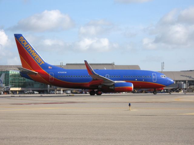 Boeing 737-700 (N769SW) - Holding on RWY 19R