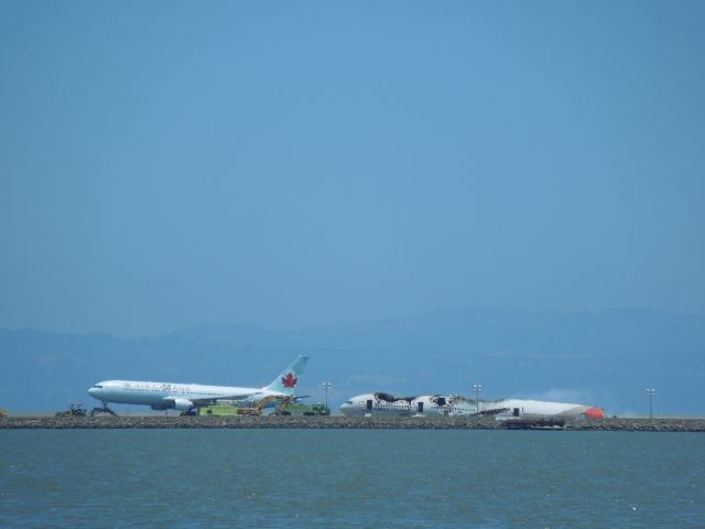 Boeing 777 (HL7742) - Air Canada 767 was the first landing on 28R in over 24 hours after the crash of Asiana 214.