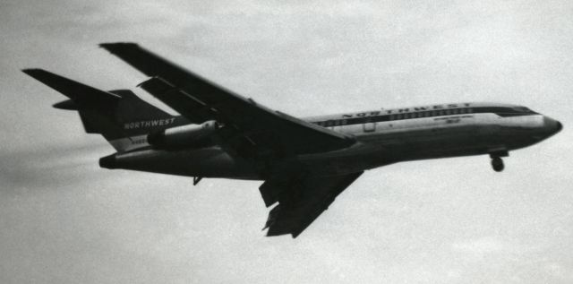 Boeing 727-100 (N498US) - This tabletop scan of a 47 year old Kodak 127 B&W film photo shows a Northwest Orient Airlines B727 (N498US) on s/final to National Airport (now Ronald Reagan Washington National ... KDCA) in 1968.  This is the first picture of NWAs N498US to be posted into the FA gallery, but a few clicks of it can be found on the web.br />> Check out all that neat black smoke!  Yeah, I know, it polluted the skies, but I have to say that, back then, the black smoke trailing behind one of these wonderful 727s looked awesome!  And the noise from these early Boeing tris was fantastic, too!  (Thumbs Up to all the older folks who fondly  remember the same sight.)