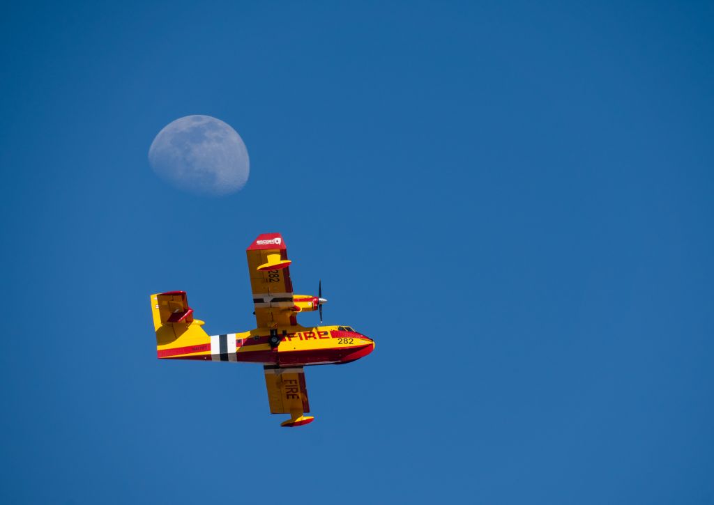 Canadair CL-415 SuperScooper (N417BT) - SCPR282 climbing out in the late afternoon from RWY02 in KSAF and headed to the Calf Canyon Fire. A welcome sight in the sky around here.