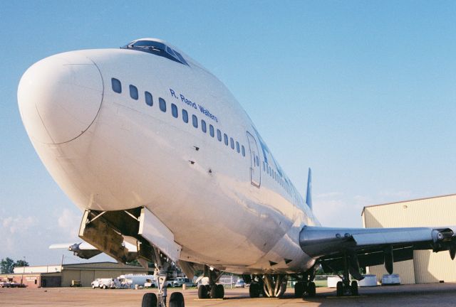 BOEING 747-100 (N857FT) - Requiem For A Heavyweight...br /br /Polar Air Cargos Boeing 747-132, named "R. Rand Walters", msn 20246, manufactured 1971 and scrapped 2003. Its FAA registration, N857FT, cancelled 2007. Photo taken of aircraft at GWO, Greenwood-Leflore Airport in 2000.br /br /It seemed such an undignified fate for such a beautiful aircraft.