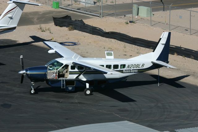 Cessna Caravan (N208LR) - KIFP - Laughlin-Bullhead City,AZ Cessna 208 on the ramp - titled Western Express.