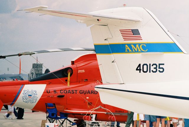 Aerospatiale Dauphin 2 (SA-365C) (USCG6597) - Photo at Barksdale AFB, 2005 Airshow - USCG HH-65B Dolphin from Mobile adjacent to a USAF C-21A.