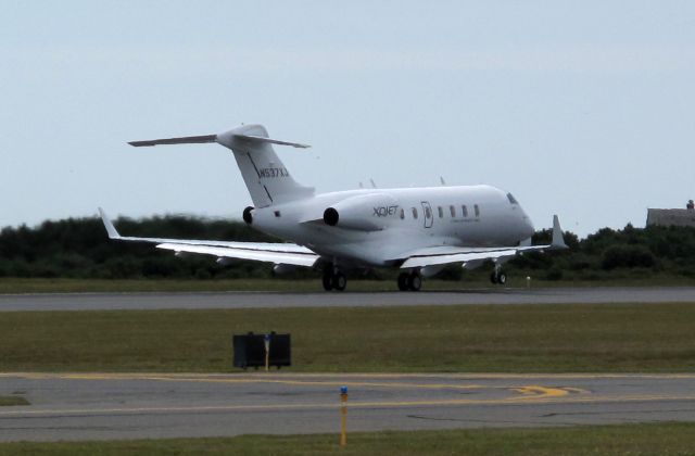 Bombardier Challenger 300 (N537XJ) - Take of RW24 at nantucket for a coast to coast flight.