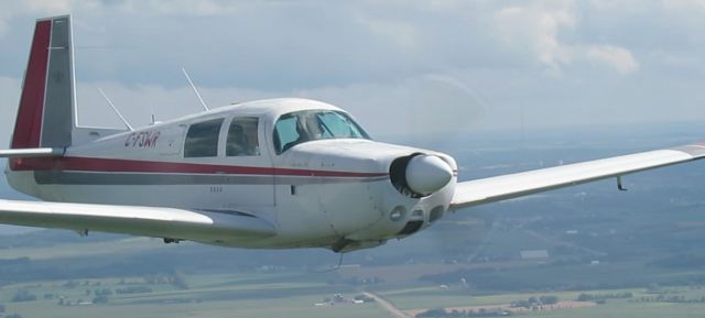 Mooney M-20 (C-FSWR) - This was taken as part of our Mooney Caravan to Oshkosh, 2013, from Madison, WI.  At 3:45 pm on 27 July 2013