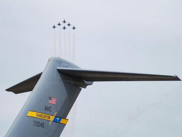 Boeing Globemaster III (N70046) - The USAF Thunderbirds rising up behind a Charleston AFB C-17 at Shaw AFB.  4/2/2022.