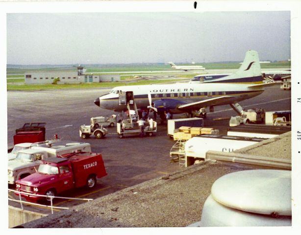 — — - How lucky was I to take an SO Martin 404 flight from ATL to ABY in 1974! This is a shot taken from the ATL observation deck, back before airports considered all passengers potential terrorists. From the DC9 in the background you can see that SO was just starting to repaint to the modern look, but there were plenty of DC9s in the traditional SO paint scheme in 1974. The Martins would never wear the new look and in fact were withdrawn from service a few months after this shot was taken, replaced by the cramped Metroliners.