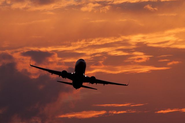 Boeing 737-900 — - Departing IAH at Sunset