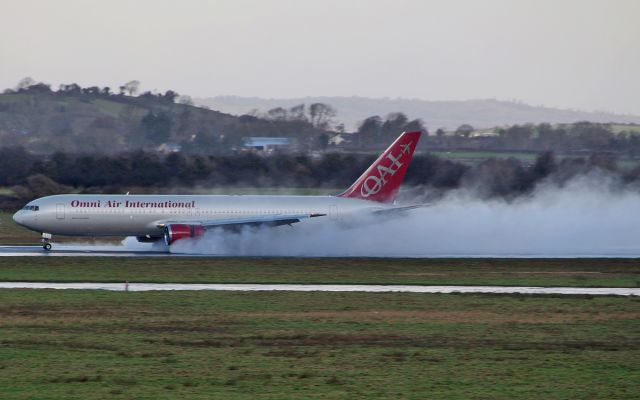 BOEING 767-300 (N351AX) - omni b767-3 n351ax landing at shannon after a heavy shower 29/1/15.