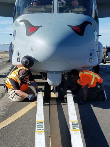 Bell V-22 Osprey — - 2018 L.A. County Air Show. Attaching tow-bar to tug the Osprey into its static display position.