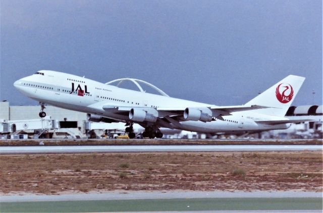 Boeing 747-200 (JA8140) - KLAX apprx Sept 1989 or 1990 the Imperial terminal was a must see TV and I do not mean my initials! My first trip to the Imperial Terminal parking lot was March 1989 and I would regret (most) all my years going to Disneyland instead of this parking lot. I think I got all of the tires off the ground on this photo.!