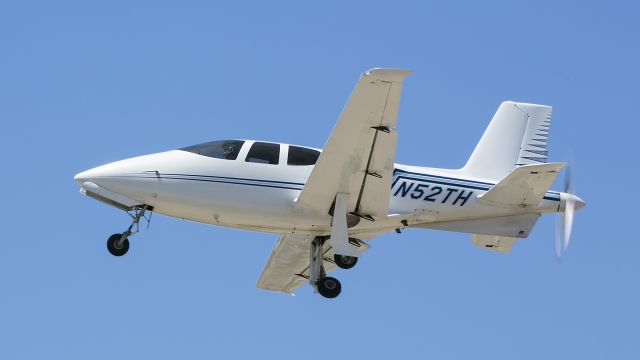 Experimental 100kts-200kts (N52TH) - This pretty Cirrus VK-30 homebuilt  was departing Whiteman Airport about lunchtime. The landing gear are retracting. This is supposed to be one of five flying early versions of the Cirrus. The later models put the engine in the front. Hit the link and read all about it: a rel=nofollow href=http://en.wikipedia.org/wiki/Cirrus_VK-30https://en.wikipedia.org/wiki/Cirrus_VK-30/a