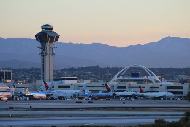 — — - LAX tower and Encounter Restaurant as seen from El Segundo overlook.