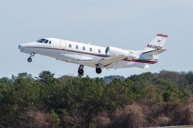 Cessna Citation V (N608QS) - Netjets Cessna Citation 560 departing Atlanta's PDK airport. Questions about this photo can be sent to Info@FlewShots.com