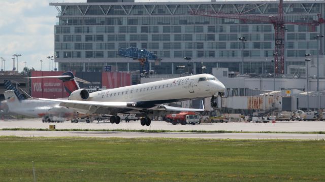 Canadair Regional Jet CRJ-900 (N538CA) - Landing runway 6R ~15:41 EDT, 2024-06-30