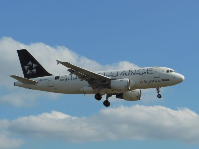 Airbus A319 (OO-SSC) - Brussels Airlines (SN) OO-SSC A319-112 [cn1086]br /London Heathrow (LHR). Brussels Airlines flight SN2095 arriving from Brussels (BRU). Painted in in Star Alliance livery.br /Taken from Northern Perimeter Road (27R Approach)br /2013 08 11br /a rel=nofollow href=http://alphayankee.smugmug.com/Airlines-and-Airliners-Portfolio/Airlines/EuropeanAirlines/Brussels-Airlines-SN/https://alphayankee.smugmug.com/Airlines-and-Airliners-Portfolio/Airlines/EuropeanAirlines/Brussels-Airlines-SN//a