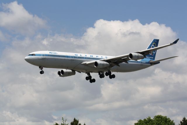 Airbus A340-300 (SX-DFD) - Arriving At Lester B. Pearson Intl Airport,Toronto,Ontario,Canada,CYYZ/YYZ Taken june22,2009