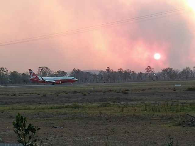 BOEING 737-300 (CGN) - The 737 Fire Bomber taking off on runway 33 to drop water at the height of the blaze that caused the evacuation of 8,000 people from Gracemere on November 30, 2018. This fire bomber and other fire fighting aircraft were instrumental in saving Gracemere and surrounding areas from destruction.