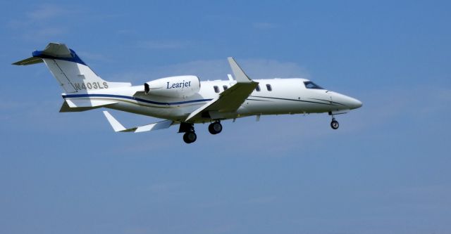 Learjet 45 (N403LS) - On final is this 2009 Learjet 45 in the Summer of 2019.