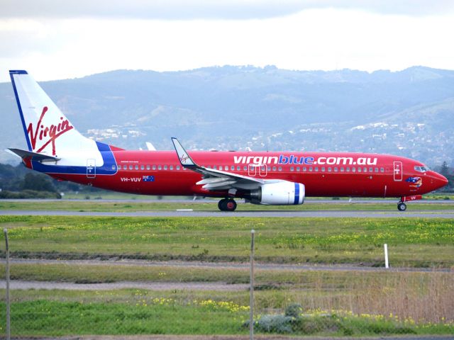 Boeing 737-800 (VH-VUV) - On taxi-way heading for take off on runway 05. Thursday 12th July 2012.