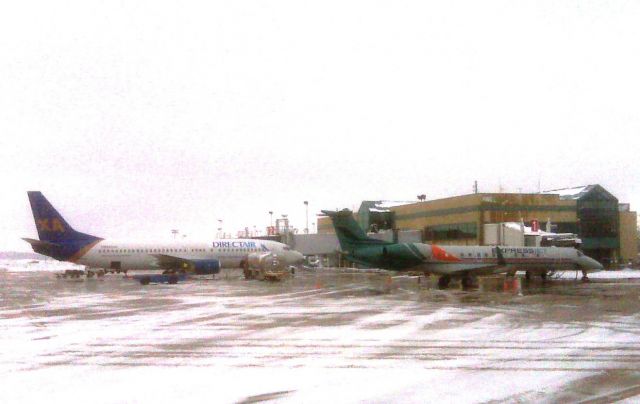 BOEING 737-300 — - Direct Air B737-300 and Express Jet EMB145 share the ramp at RFD.