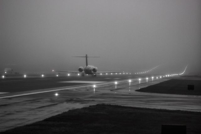 Boeing 717-200 — - Delta 717 departs into the abyss on 8 Left.