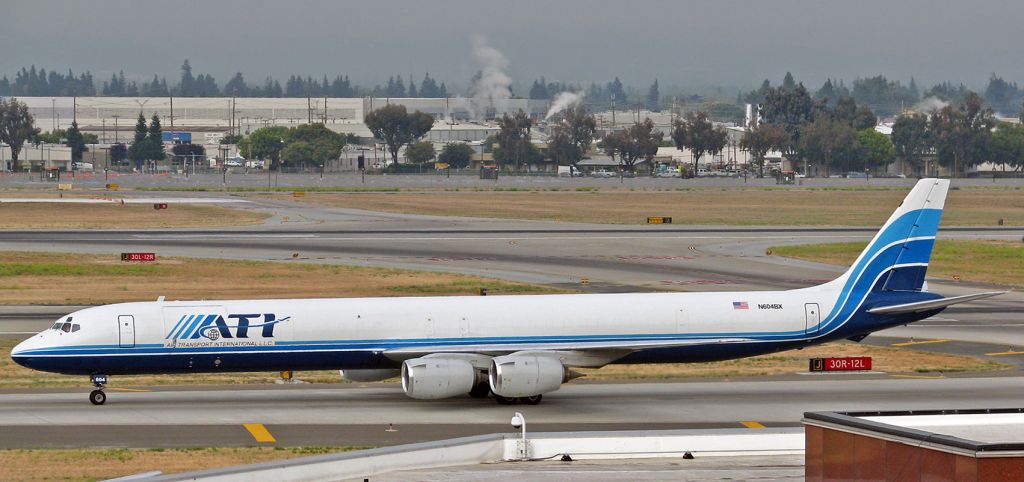 McDonnell Douglas DC-8-70 (N604BX) - After landing on 30L, ATI's N604BX provided a nice photo op as it taxied by.br /Prior to flying for ATN, this long bird flew for Flying Tigers, American Flyers, and Emery Worldwide, all with reg. N792FT..  