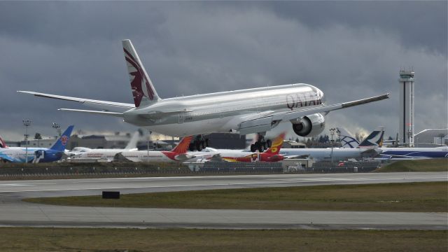 BOEING 777-300 (A7-BAW) - BOE889 on final approach to runway 16R to complete a flight test on 1/25/13. (LN:1071 c/n 41741).