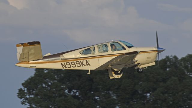 Beechcraft 35 Bonanza (N999KA) - Departing AirVenture 2023 on runway 18R