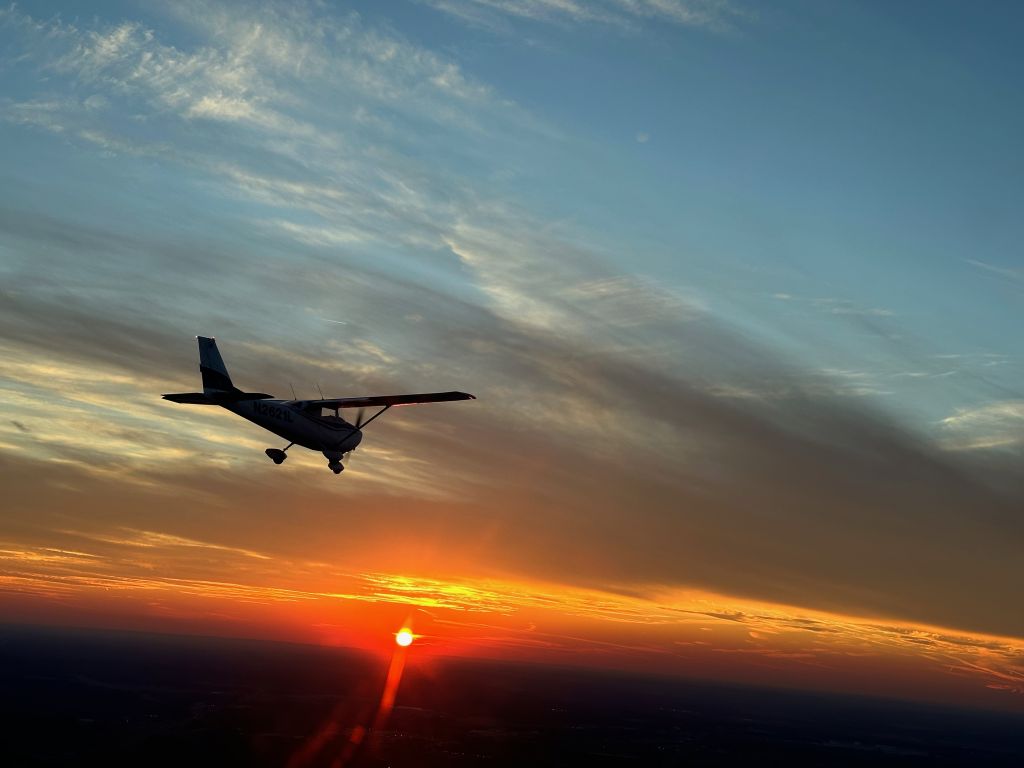 Cessna Skyhawk (N2621L) - N2621L captured in flight down the Tennessee River against a beautiful Alabama fall sunset. 
