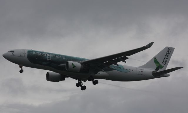 Airbus A330-200 (CS-TRY) - Just about to land at Logan after heavy rains passed through the Boston area.