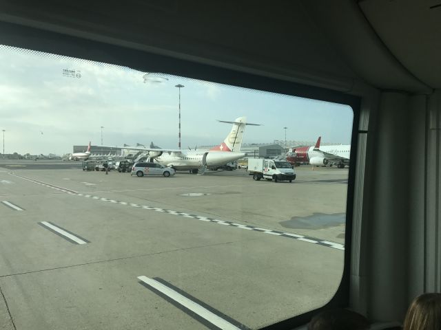 Aerospatiale ATR-72-500 (HB-ACN) -  HB-ACB Etihad Regional ATR 72-500 (72-212A)  was being serviced prior to take off as our bus ð passed by. We had just landed at FCO Flumicino in Italy ð®ð¹ Notice it carries the Swiss Airlines livery.