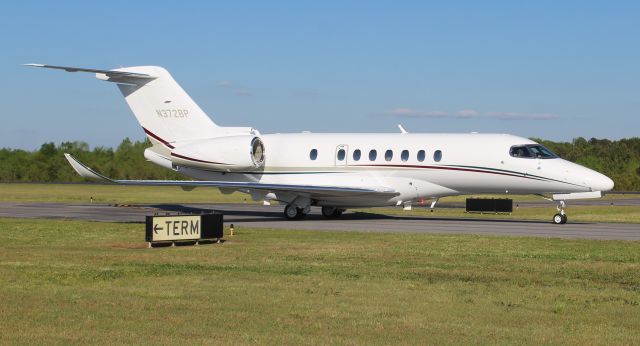 Cessna Citation Longitude (N372BP) - A 2021 model Textron (Cessna) 700 Citation Longitude, taxiing for departure at Boswell Field, Talladega Municipal Airport, AL, following the NASCAR GEICO 500 race at Talladega Super Speedway - late afternoon, April 25, 2021. 