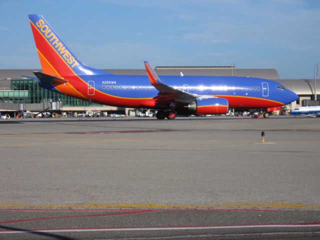 Boeing 737-700 (N255WN) - Holding on RWY 19R