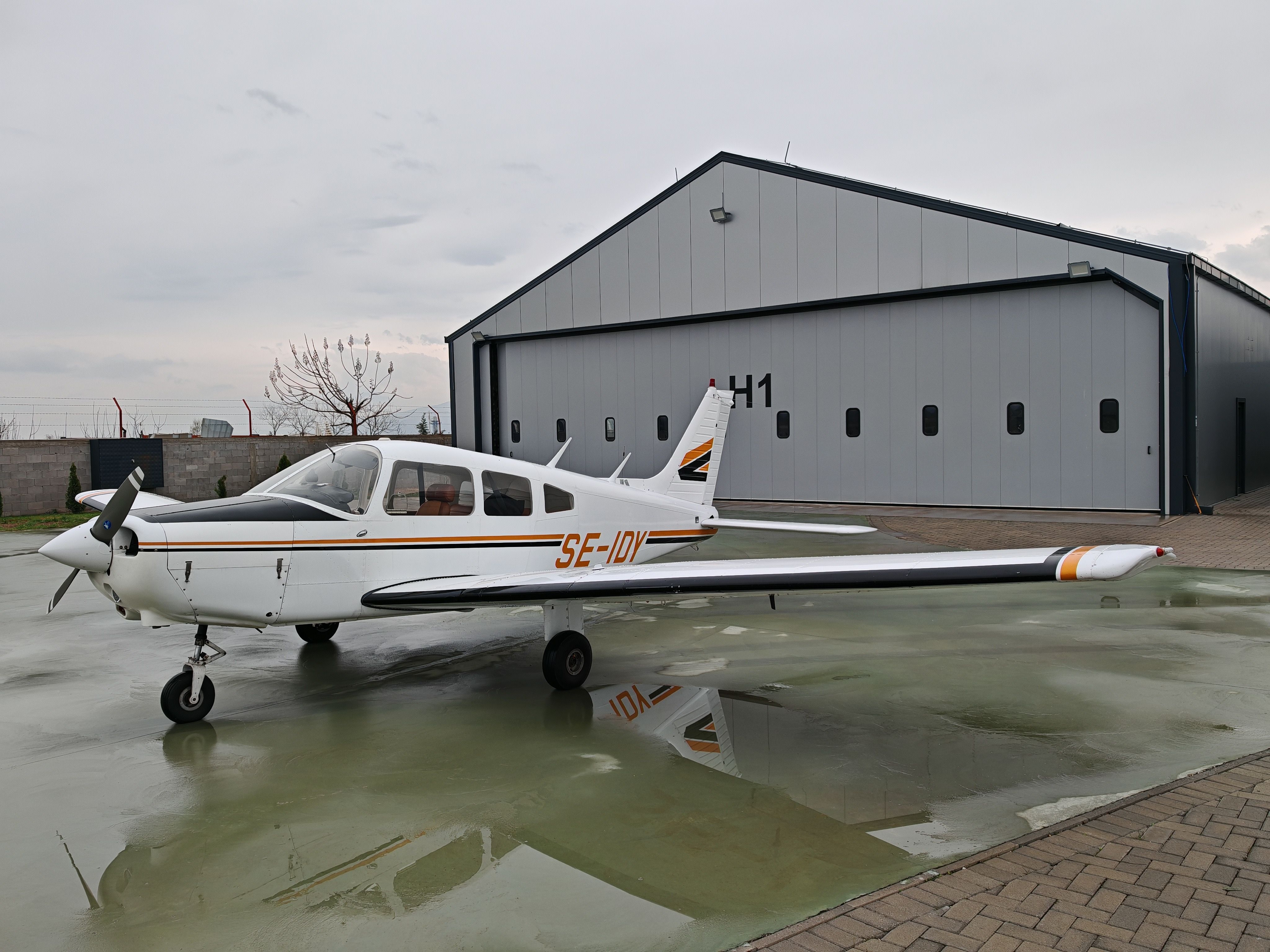 Piper Cherokee (SE-IDY) - Sweden, Base of the owner of SE-IDY, out of the GMS hangar.
