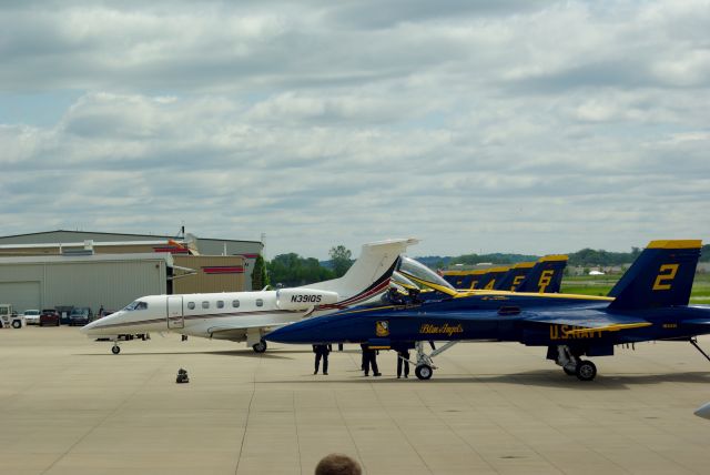 Embraer Phenom 300 (N391QS) - N391QS taxis past the Blue Angels onto the TAC Air ramp at KSUS a few minutes before the 2016 Spirit Air Show began.